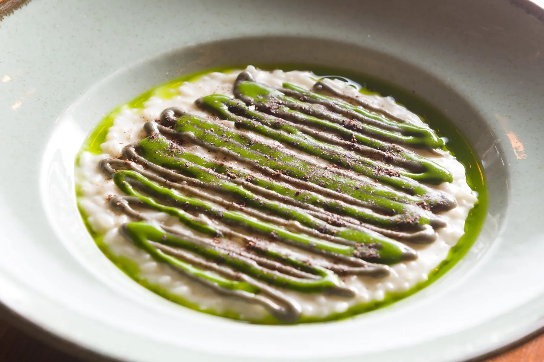 Risotto mantecato con olio alle erbe di Dume